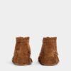 Bottes à lacets avec tresses et perles Bottes à lacets avec tresses et perles