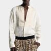 Chemise à col tombant et nœud papillon