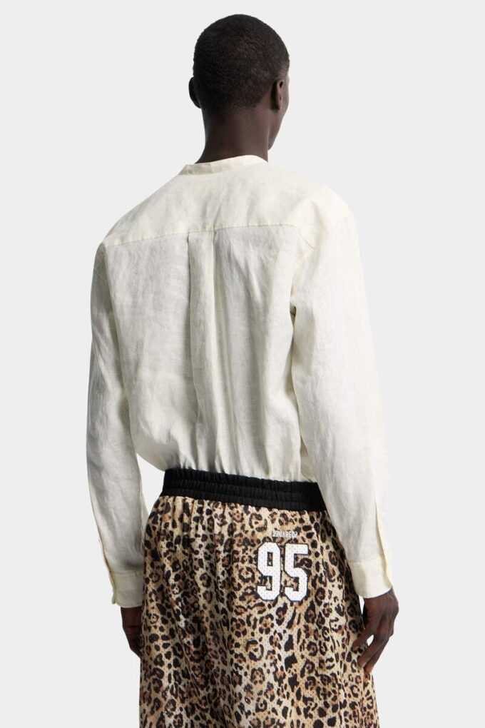 Chemise à col tombant et nœud papillon