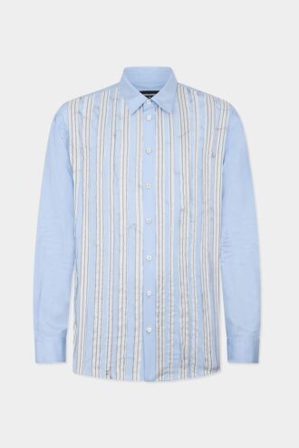 Chemise à épaules tombantes et bords bruts