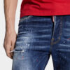 Jeans 642 délavage à taches rouges moyennes