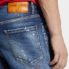 Jeans 642 délavage à taches rouges moyennes