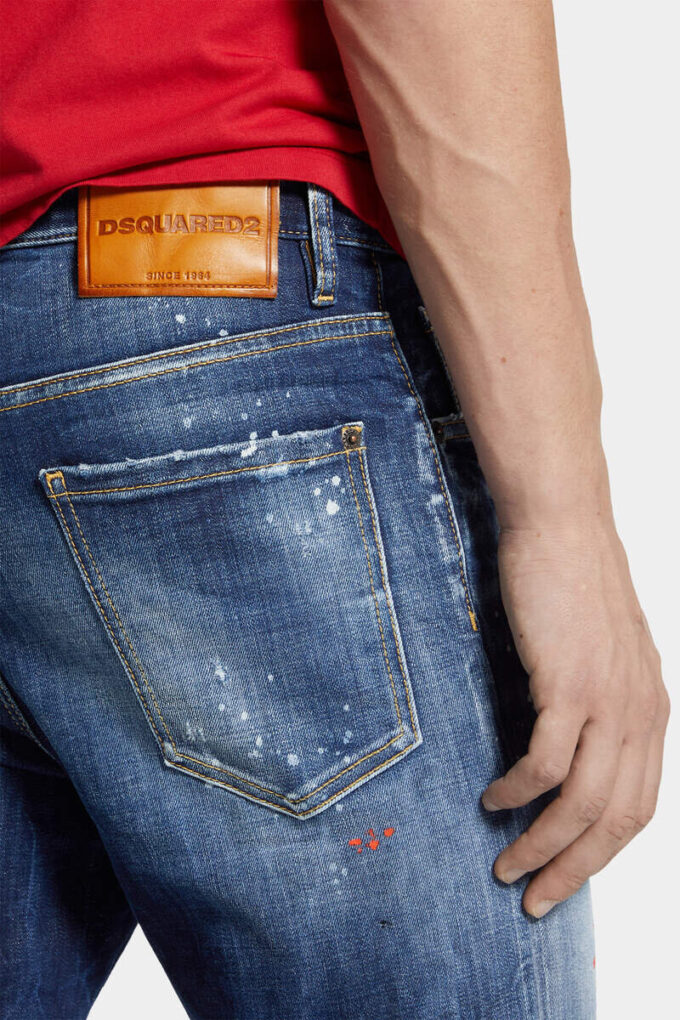 Jeans 642 délavage à taches rouges moyennes